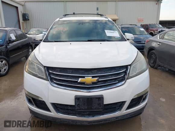 2014 Chevrolet Traverse LT z VIN 1GNKRHKD0EJ293923, wystawiony jako IAAI lot #42900872 z przebiegiem 179 018 mil mil oraz . Historia ofert i sprzedaży dostępna na DreamBid. Obrazek 12.