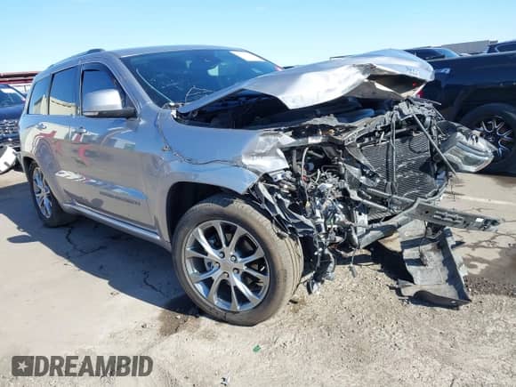 2020 Jeep Grand Cherokee Summit with VIN 1C4RJFJG2LC173184, listed as a IAAI auction lot 41343182 with 70,192 mi miles and . Bid and sale history available at DreamBid. Image 1.