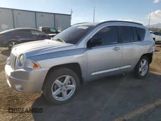 2010 Jeep Compass Limited с VIN 1J4NT5FB1AD641584, выставлен на аукционе Copart как лот 84430515 с пробегом 136 119 миль миль и Списание • Salvage title. История ставок и продаж доступна на DreamBid. Изображение 1.