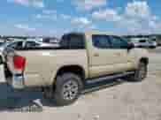 2017 Toyota Tacoma SR5 z VIN 5TFCZ5AN6HX090087, wystawiony jako Copart lot #85678565 z przebiegiem 179 577 mil mil oraz Szkoda całkowita • Salvage title. Historia ofert i sprzedaży dostępna na DreamBid. Obrazek 3.