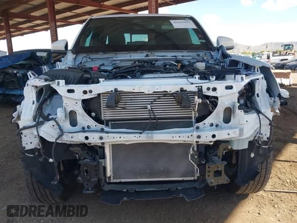 2024 Toyota Tacoma SR5 with VIN 3TMLB5JN2RM050911, listed as a IAAI auction lot 43169415 with 19,000 mi miles and . Bid and sale history available at DreamBid. Image 6.