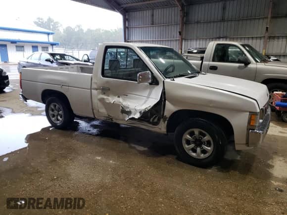 1997 Nissan Frontier XE with VIN 1N6SD11S7VC347105, listed as a Copart auction lot 85150705 with 255,765 mi miles and Salvage title. Bid and sale history available at DreamBid. Image 4.