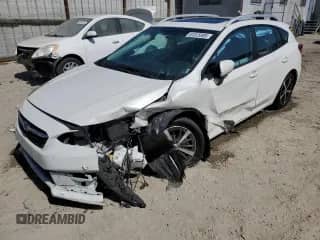 2022 Subaru Impreza Premium with VIN 4S3GTAD66N3703957, listed as a Copart auction lot 61875905 with 61,800 mi miles and Salvage title. Bid and sale history available at DreamBid. Image 1.