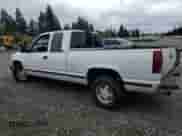 1996 GMC Sierra 1500 z VIN 2GTEC19R4T1541100, wystawiony jako Copart lot #54959405 z przebiegiem 184 206 mil mil oraz Szkoda całkowita • Salvage title. Historia ofert i sprzedaży dostępna na DreamBid. Obrazek 2.