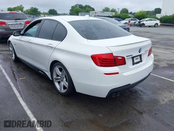 2014 BMW 5 Series 535d with VIN WBAXA5C53ED690727, listed as a IAAI auction lot 42344800 with 128,153 mi miles and . Bid and sale history available at DreamBid. Image 3.