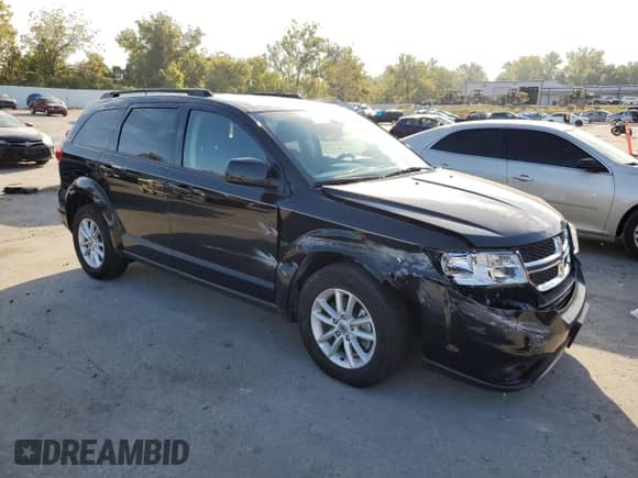2019 Dodge Journey SE with VIN 3C4PDCBG7KT836800, listed as a Copart auction lot 84945285 with 36,969 mi miles and Salvage title. Bid and sale history available at DreamBid. Image 4.