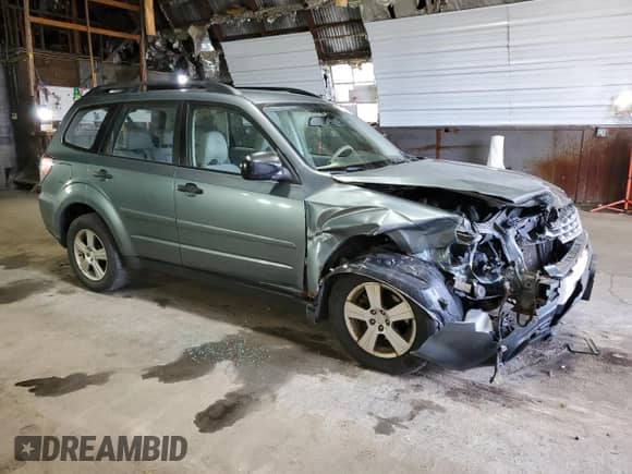 2011 Subaru Forester X with VIN JF2SHABC3BH776062, listed as a Copart auction lot 87313785 with 174,593 mi miles and Salvage title. Bid and sale history available at DreamBid. Image 4.