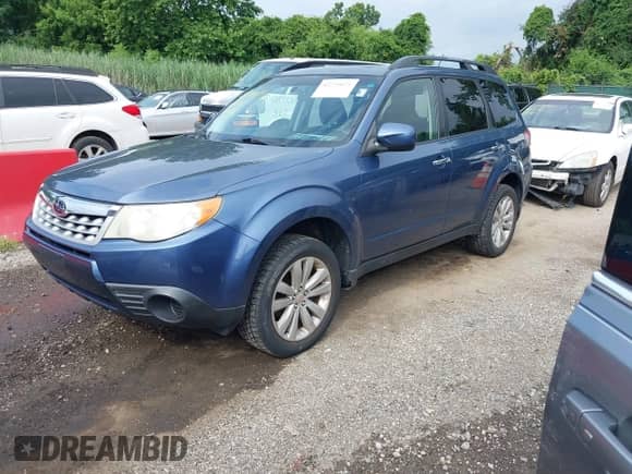 2012 Subaru Forester X Premium z VIN JF2SHADC5CH412689, wystawiony jako IAAI lot #42771071 z przebiegiem 143 409 mil mil oraz . Historia ofert i sprzedaży dostępna na DreamBid. Obrazek 2.