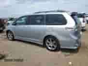 2014 Toyota Sienna SE with VIN 5TDXK3DC0ES412437, listed as a Copart auction lot 70558525 with 145,488 mi miles and Salvage title. Bid and sale history available at DreamBid. Image 2.