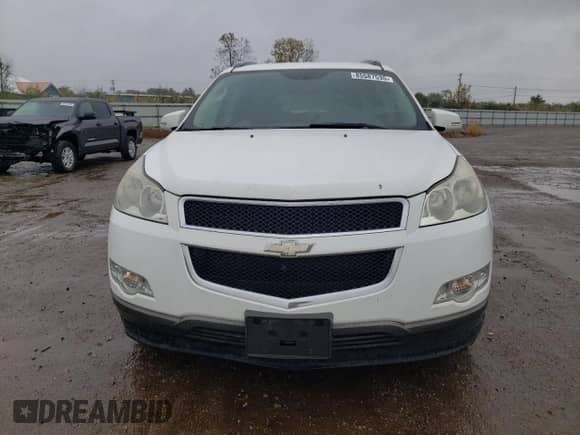 2010 Chevrolet Traverse 1LT с VIN 1GNLRFED6AS127284, выставлен на аукционе Copart как лот 85587535 с пробегом 235 773 миль миль и Списание • Salvage title. История ставок и продаж доступна на DreamBid. Изображение 5.