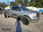 2013 Toyota Tundra с VIN 5TFUW5F1XDX306407, выставлен на аукционе Copart как лот 70155815 с пробегом 243 396 миль миль и Списание • Salvage title. История ставок и продаж доступна на DreamBid. Изображение 4.