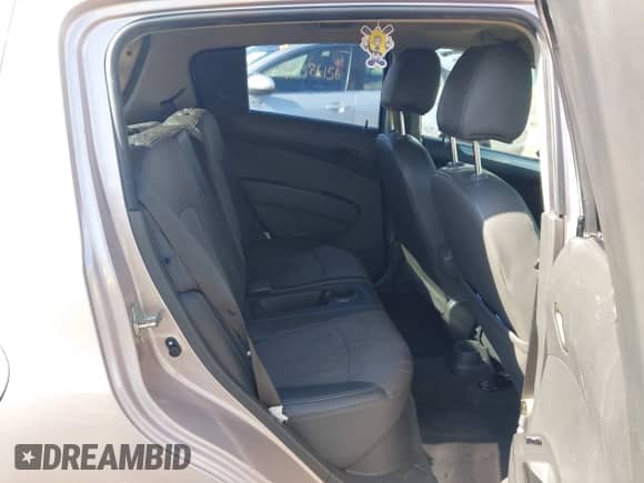 2013 Chevrolet Spark LS z VIN KL8CB6S93DC583599, wystawiony jako IAAI lot #43396778 z przebiegiem 101 563 mil mil oraz . Historia ofert i sprzedaży dostępna na DreamBid. Obrazek 8.