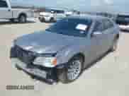 2013 Chrysler 300 with VIN 2C3CCAAG9DH727908, listed as a IAAI auction lot 42702399 with 105,987 mi miles and . Bid and sale history available at DreamBid. Image 6.