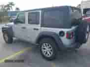 2023 Jeep Wrangler Sport S z VIN 1C4HJXDNXPW702199, wystawiony jako IAAI lot #41859413 z przebiegiem 24 942 mil mil oraz . Historia ofert i sprzedaży dostępna na DreamBid. Obrazek 3.