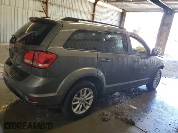 2013 Dodge Journey SXT с VIN 3C4PDDBG4DT730264, выставлен на аукционе Copart как лот 71796495 с пробегом 143 867 миль миль и Списание • Salvage title. История ставок и продаж доступна на DreamBid. Изображение 3.