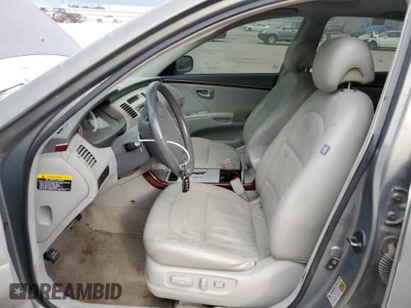 2007 Hyundai Azera GLS z VIN KMHFC46D47A211835, wystawiony jako Copart lot #76190184 z przebiegiem 150 798 mil mil oraz Szkoda całkowita • Salvage title. Historia ofert i sprzedaży dostępna na DreamBid. Obrazek 7.