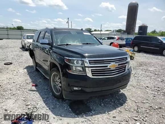2015 Chevrolet Tahoe LTZ с VIN 1GNSCCKC9FR101350, выставлен на аукционе Copart как лот 62014125 с пробегом 173 821 миль миль и Списание • Salvage title. История ставок и продаж доступна на DreamBid. Изображение 14.