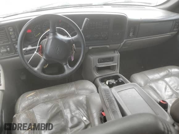 2000 Chevrolet Tahoe LS with VIN 1GNEK13T5YJ150744, listed as a Copart auction lot 71294815 with 214,737 mi miles and Salvage title. Bid and sale history available at DreamBid. Image 8.