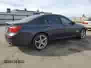2012 BMW 7 Series 750i with VIN WBAKA8C58CDS99694, listed as a Copart auction lot 46828435 with 131,458 mi miles and Salvage title. Bid and sale history available at DreamBid. Image 3.