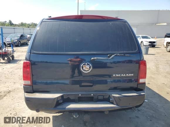 2004 Cadillac Escalade z VIN 1GYEK63N34R193363, wystawiony jako Copart lot #66896495 z przebiegiem Nie podano mil oraz Czysty tytuł • Clean title. Historia ofert i sprzedaży dostępna na DreamBid. Obrazek 6.