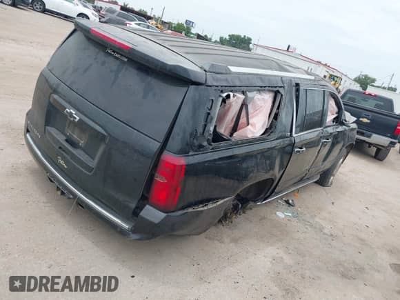 2015 Chevrolet Suburban LTZ с VIN 1GNSKKKC7FR518477, выставлен на аукционе IAAI как лот 42742748 с пробегом Не указан миль и . История ставок и продаж доступна на DreamBid. Изображение 4.