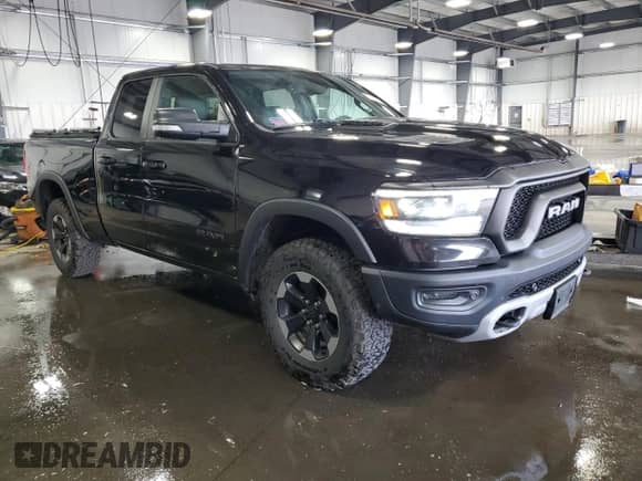 2019 Ram 1500 Rebel z VIN 1C6SRFET7KN746866, wystawiony jako Copart lot #70141445 z przebiegiem 67 389 mil mil oraz Szkoda całkowita • Salvage title. Historia ofert i sprzedaży dostępna na DreamBid. Obrazek 4.