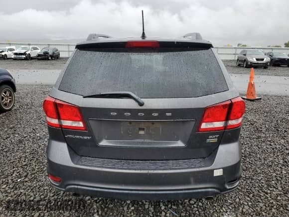 2015 Dodge Journey SXT with VIN 3C4PDCBG0FT718061, listed as a Copart auction lot 82205215 with 174,494 mi miles and Clean title. Bid and sale history available at DreamBid. Image 6.