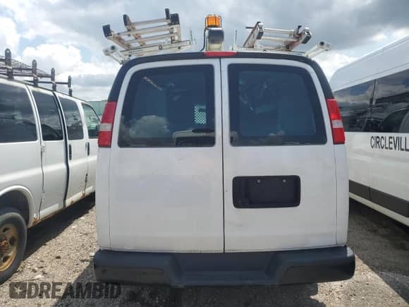 2018 Chevrolet Express Cargo с VIN 1GCWGAFP4J1339954, выставлен на аукционе Copart как лот 66054025 с пробегом 93 524 миль миль и Списание • Salvage title. История ставок и продаж доступна на DreamBid. Изображение 6.