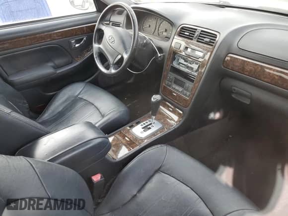 2001 Hyundai XG with VIN KMHFU45D01A105534, listed as a Copart auction lot 49597965 with 165,391 mi miles and Salvage title. Bid and sale history available at DreamBid. Image 8.