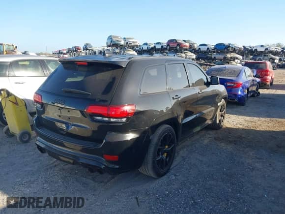 2018 Jeep Grand Cherokee Trackhawk z VIN 1C4RJFN95JC283798, wystawiony jako IAAI lot #40739384 z przebiegiem 54 065 mil mil oraz . Historia ofert i sprzedaży dostępna na DreamBid. Obrazek 4.