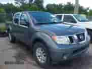 2021 Nissan Frontier SV with VIN 1N6ED0EA4MN703618, listed as a IAAI auction lot 42930673 with 71,638 mi miles and . Bid and sale history available at DreamBid. Image 1.