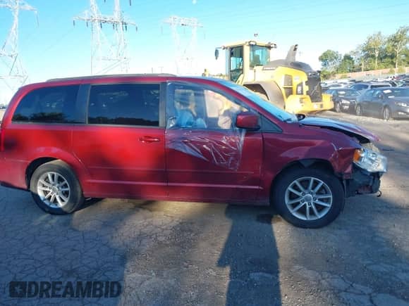 2016 Dodge Grand Caravan SXT with VIN 2C4RDGCG4GR161335, listed as a IAAI auction lot 43414142 with 124,679 mi miles and . Bid and sale history available at DreamBid. Image 14.