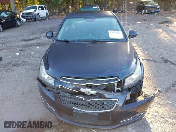 2014 Chevrolet Cruze 2LT z VIN 1G1PE5SB2E7122071, wystawiony jako IAAI lot #43346988 z przebiegiem 179 071 mil mil oraz . Historia ofert i sprzedaży dostępna na DreamBid. Obrazek 12.