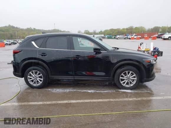 2023 Mazda CX-5 S Carbon Edition z VIN JM3KFBCM3P0126856, wystawiony jako IAAI lot #42020069 z przebiegiem 9 728 mil mil oraz . Historia ofert i sprzedaży dostępna na DreamBid. Obrazek 13.