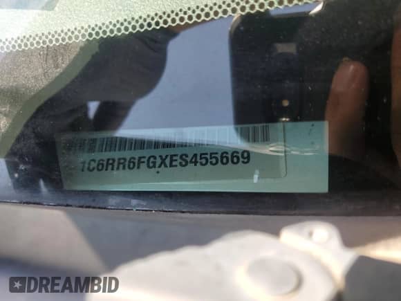 2014 Ram 1500 Tradesman с VIN 1C6RR6FGXES455669, выставлен на аукционе Copart как лот 68949585 с пробегом Не указан миль и Списание • Salvage title. История ставок и продаж доступна на DreamBid. Изображение 13.