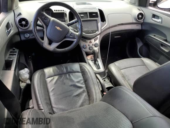2016 Chevrolet Sonic LTZ with VIN 1G1JE5SB9G4143039, listed as a Copart auction lot 81403265 with 79,849 mi miles and Salvage title. Bid and sale history available at DreamBid. Image 8.