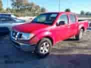2009 Nissan Frontier SE with VIN 1N6AD07U19C419811, listed as a IAAI auction lot 41090904 with 141,119 mi miles and . Bid and sale history available at DreamBid. Image 2.