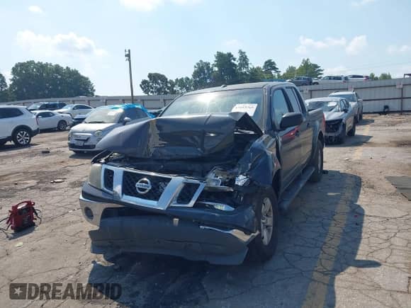 2011 Nissan Frontier SV with VIN 1N6AD0ER4BC403249, listed as a IAAI auction lot 43153765 with 317,205 mi miles and . Bid and sale history available at DreamBid. Image 2.