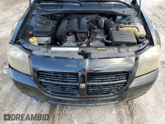 2005 Dodge Magnum SE with VIN 2D4FV48V55H692409, listed as a Copart auction lot 55905624 with 221,676 mi miles and Salvage title. Bid and sale history available at DreamBid. Image 11.