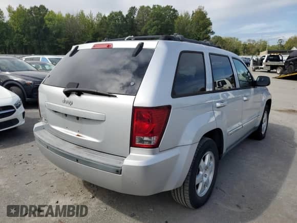 2010 Jeep Grand Cherokee Laredo с VIN 1J4PR4GK5AC147850, выставлен на аукционе Copart как лот 80473765 с пробегом 143 534 миль миль и Чистый • Clean title. История ставок и продаж доступна на DreamBid. Изображение 3.