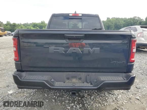 2025 Ram 1500 Tradesman with VIN 1C6RRFGG5SN592771, listed as a Copart auction lot 59027905 with 10,450 mi miles and Salvage title. Bid and sale history available at DreamBid. Image 6.