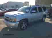 2014 Chevrolet Tahoe LS with VIN 1GNSCAE06ER144631, listed as a IAAI auction lot 42872921 with 196,796 mi miles and . Bid and sale history available at DreamBid. Image 2.