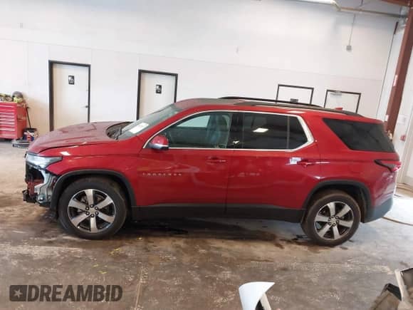 2023 Chevrolet Traverse LT z VIN 1GNEVHKW9PJ328312, wystawiony jako IAAI lot #43022557 z przebiegiem 21 740 mil mil oraz . Historia ofert i sprzedaży dostępna na DreamBid. Obrazek 14.