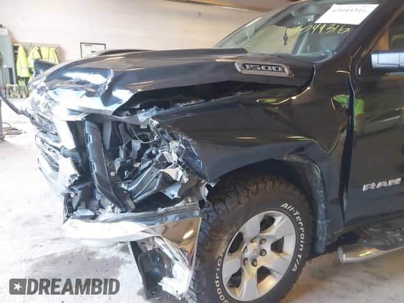 2019 Ram 1500 Big Horn z VIN 1C6RRFFGXKN751754, wystawiony jako IAAI lot #43044316 z przebiegiem 95 206 mil mil oraz . Historia ofert i sprzedaży dostępna na DreamBid. Obrazek 6.