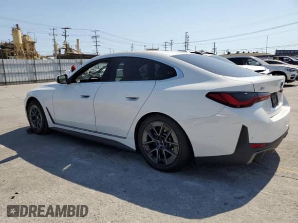 2024 BMW i4 eDrive35 with VIN WBY43AW04RFR59223, listed as a Copart auction lot 70545195 with 30,051 mi miles and Salvage title. Bid and sale history available at DreamBid. Image 2.