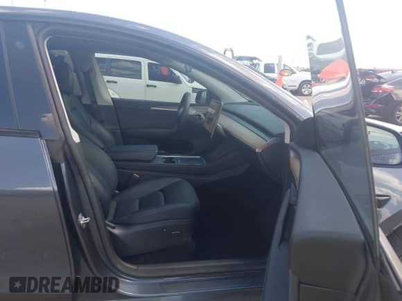 2023 Tesla Model Y Performance with VIN 7SAYGDEF4PF785348, listed as a IAAI auction lot 43314002 with 62,857 mi miles and . Bid and sale history available at DreamBid. Image 5.