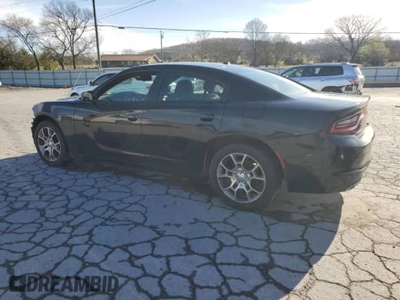 2015 Dodge Charger SE with VIN 2C3CDXFG2FH810382, listed as a Copart auction lot 49822875 with 133,834 mi miles and Clean title. Bid and sale history available at DreamBid. Image 2.
