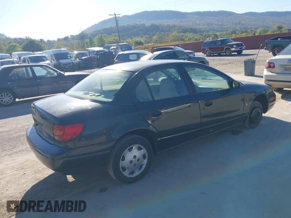 2000 Saturn SL with VIN 1G8ZG5286YZ236432, listed as a IAAI auction lot 43350377 with 146,104 mi miles and . Bid and sale history available at DreamBid. Image 4.