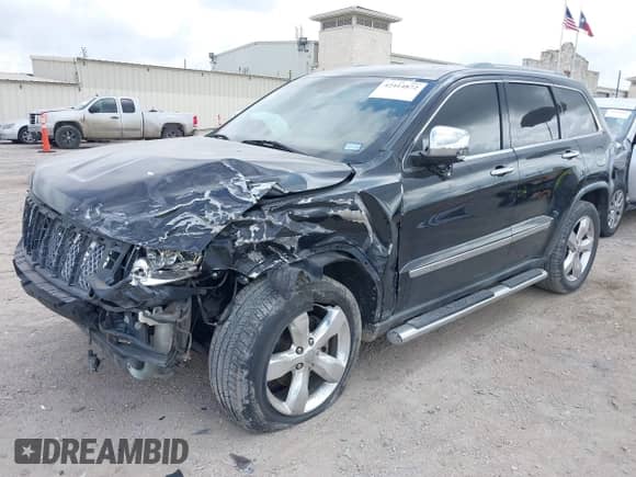 2012 Jeep Grand Cherokee Overland z VIN 1C4RJECT5CC157498, wystawiony jako IAAI lot #42414872 z przebiegiem 133 087 mil mil oraz . Historia ofert i sprzedaży dostępna na DreamBid. Obrazek 2.