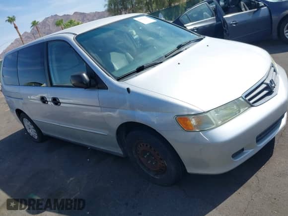 2004 Honda Odyssey LX with VIN 5FNRL18524B063998, listed as a IAAI auction lot 43022221 with 174,551 mi miles and . Bid and sale history available at DreamBid. Image 14.